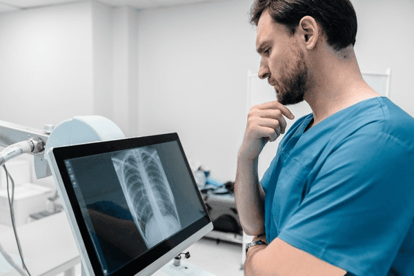 A man goes for a routine checkup. The doctor looks at the X-ray and says, “I’m sorry.”